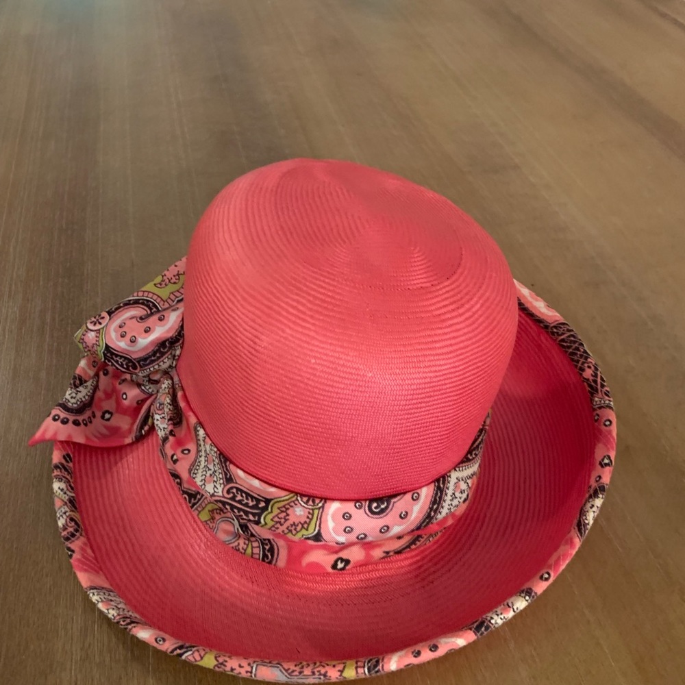 Vintage Mr John’s hot pink hat with ribbon.